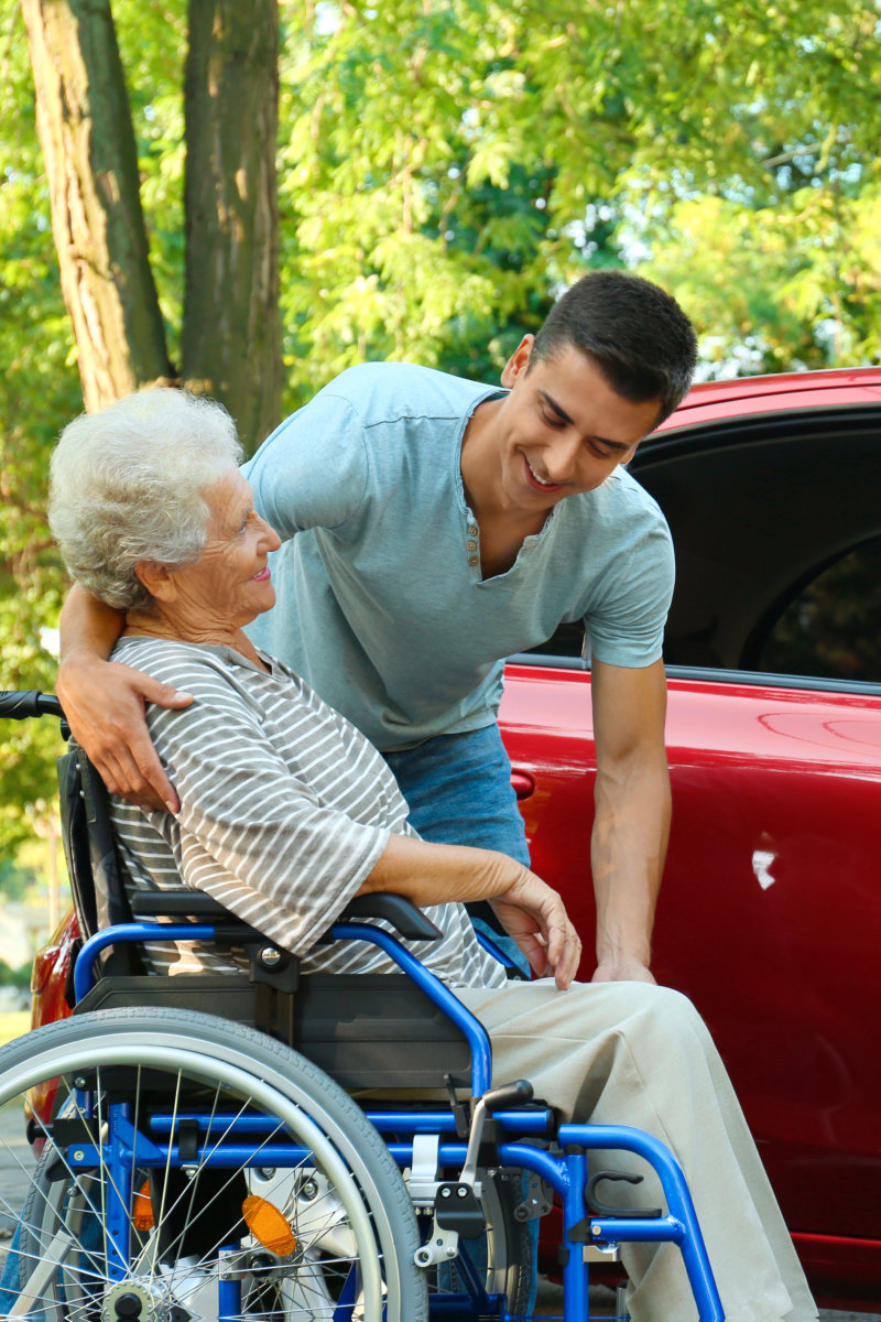 man assisting elder