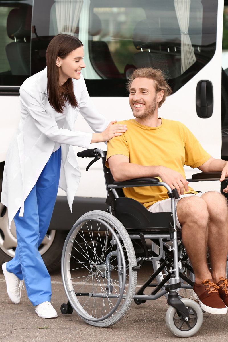 man assisting elder